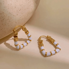 Angled view of the 14K Gold-Plated Elegant Enamel Dripping Geometric Earrings
