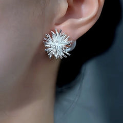 Close-up detail of the sparkling zircons and plating on the Pearl Jacket Earrings
