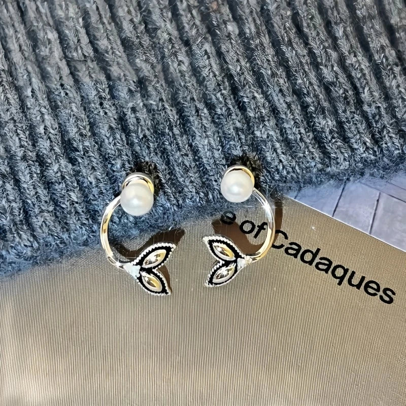 Angled view of the 14K Gold-Plated Elegant Fishtail Bead Earrings