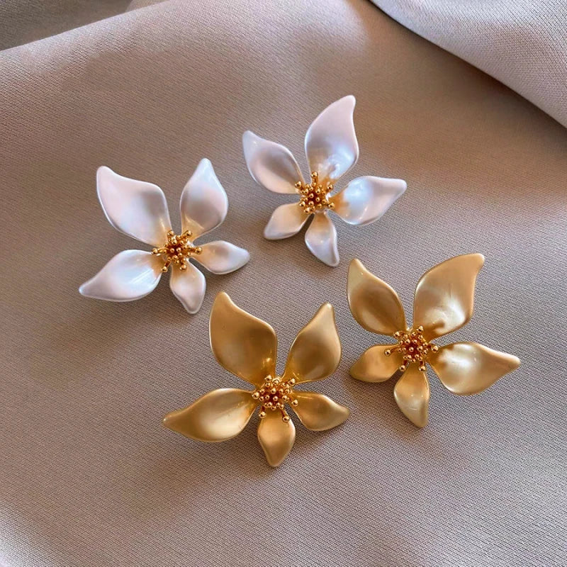 Close-up detail of the sparkling zircons and plating on the Flower Stud Earrings