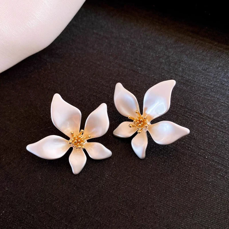 Angled view of the 14K Gold-Plated Elegant Flower Earrings