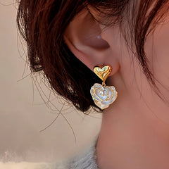 Angled view of the 14K Gold-Plated Elegant Flower Heart-Design Earrings
