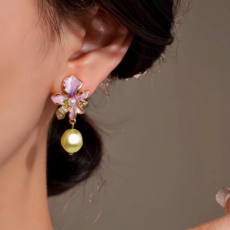 Close-up detail of the sparkling zircons and plating on the Pearl Tassel Earrings