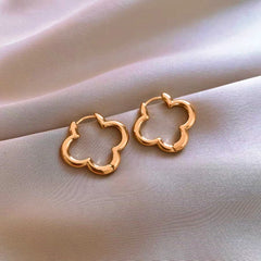 Angled view of the 14K Gold-Plated Elegant Four-Leaf Clover Earrings