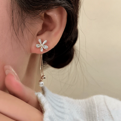 Close-up detail of the sparkling zircons and plating on the Flower Tassel Earrings
