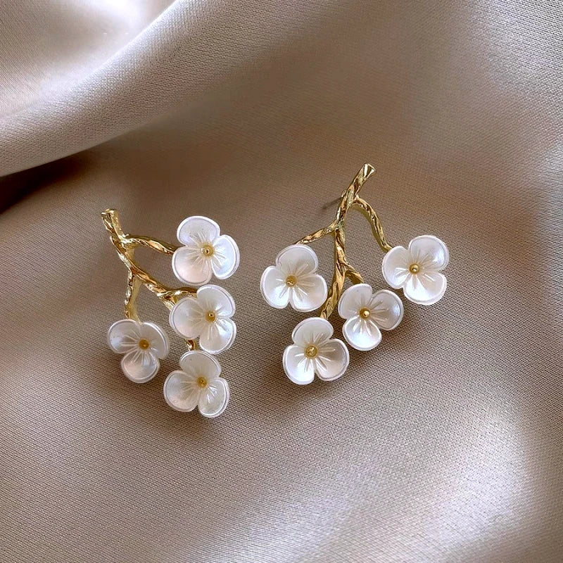 Angled view of the 14K Gold-Plated Elegant Fresh Sweet Flower Earrings