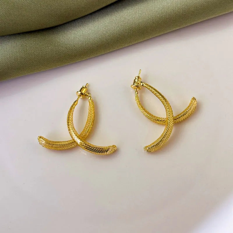 Close-up detail of the sparkling zircons and plating on the Front and Back Earrings