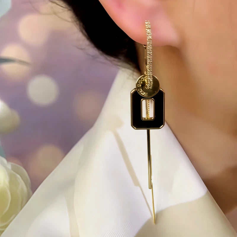 Close-up detail of the sparkling zircons and plating on the Long Tassel Earrings