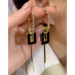 Angled view of the 14K Gold-Plated Elegant Geometric Square Long Tassel Earrings