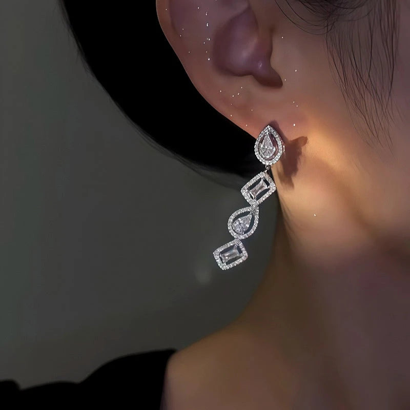 Close-up detail of the sparkling zircons and plating on the Geometric Diamond Earrings