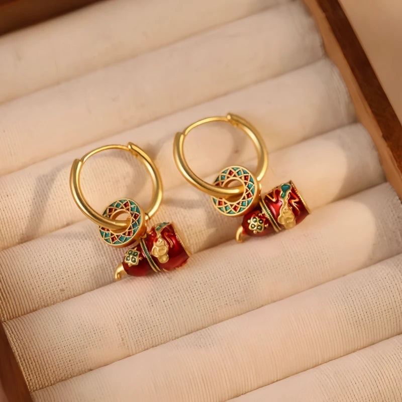 Close-up detail of the sparkling zircons and plating on the Gourd Earrings