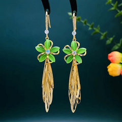Angled view of the 14K Gold-Plated Elegant Green Cat's Eye Stone Flower Tassel Ear Hook Earrings