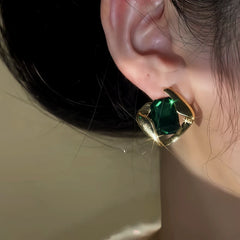 Close-up detail of the sparkling zircons and plating on the Green Crystal Earrings