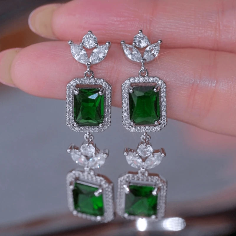 Angled view of the 14K Gold-Plated Elegant Green Diamond Earrings