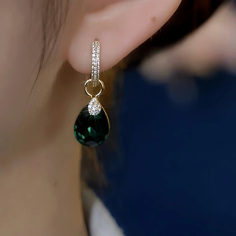 Close-up detail of the sparkling zircons and plating on the Green Zircon Water Drop Earrings