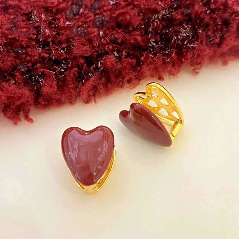 Angled view of the 14K Gold-Plated Elegant Heart- Design Earrings