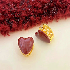 Angled view of the 14K Gold-Plated Elegant Heart- Design Earrings