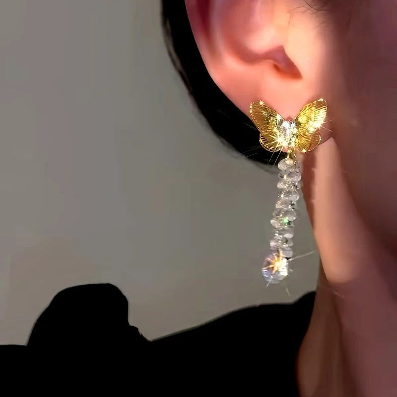 Close-up detail of the sparkling zircons and plating on the Butterfly Tassel Earrings