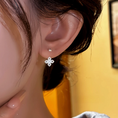 Close-up detail of the sparkling zircons and plating on the Flower Jacket Earrings