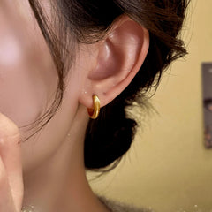 Angled view of the 14K Gold-Plated Elegant Hoop Earrings