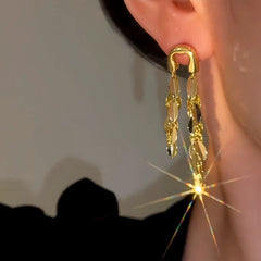 Close-up detail of the sparkling zircons and plating on the Long Tassel Earrings