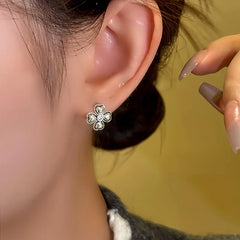 Angled view of the 14K Gold-Plated Elegant Lucky Grass Bead Earrings