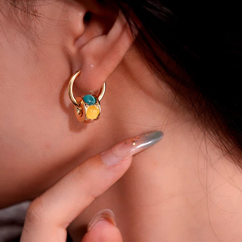 Close-up detail of the sparkling zircons and plating on the Luxury Cat's Eye Earrings