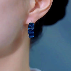 Close-up detail of the sparkling zircons and plating on the Blue Zircon Hoop Earrings