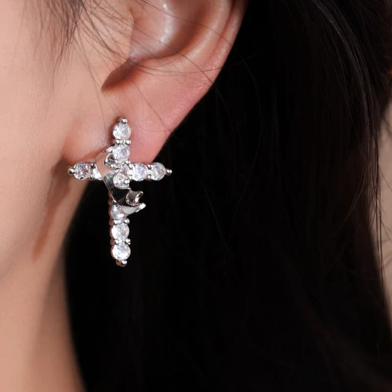 Close-up detail of the sparkling zircons and plating on the Crown Cross Earrings