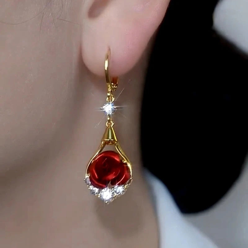 Close-up detail of the sparkling zircons and plating on the Red Rose Earrings