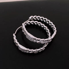 Angled view of the 14K Gold-Plated Elegant Luxury Zircon Hoop Earrings