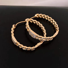 Model showcasing the dangle and style of the 14K Gold-Plated Elegant Luxury Zircon Hoop Earrings