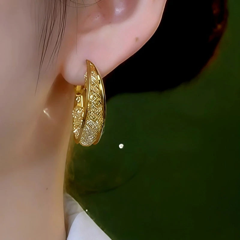 Close-up detail of the sparkling zircons and plating on the Mesh Hoop Earrings