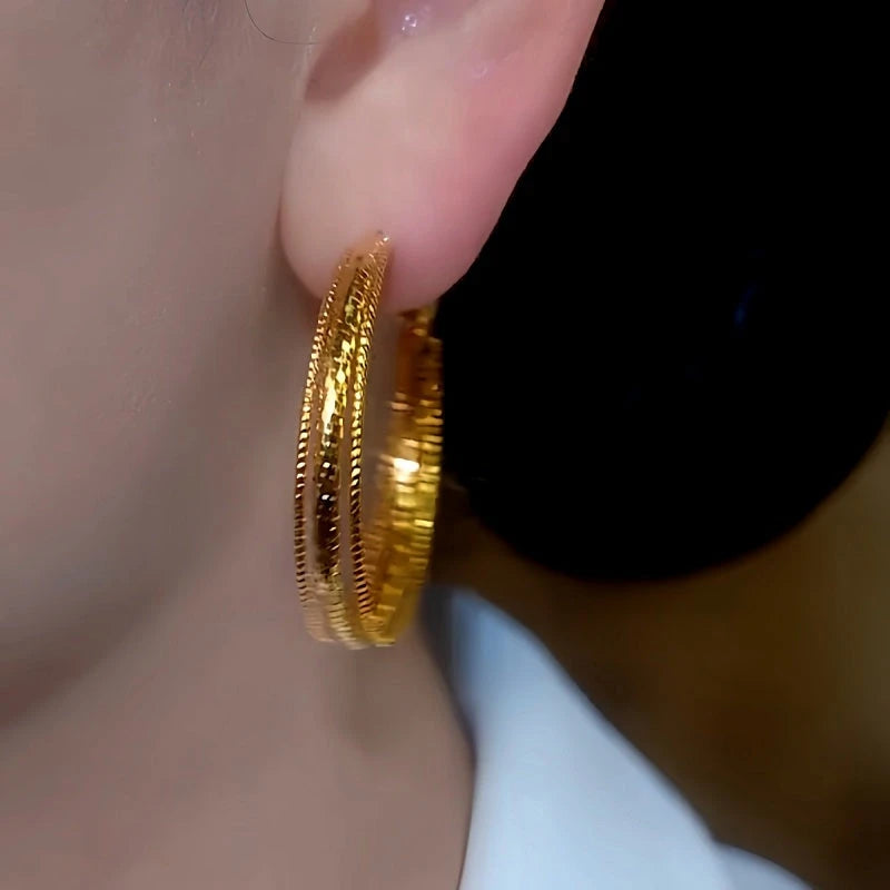 Close-up detail of the sparkling zircons and plating on the Multi-Layer Hoop Earrings