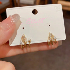 Close-up detail of the sparkling zircons and plating on the Zircon Leaf Pearl Studs