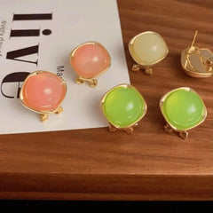 Angled view of the 14K Gold-Plated Elegant Oil-Drop Round Geometric Stud Earrings