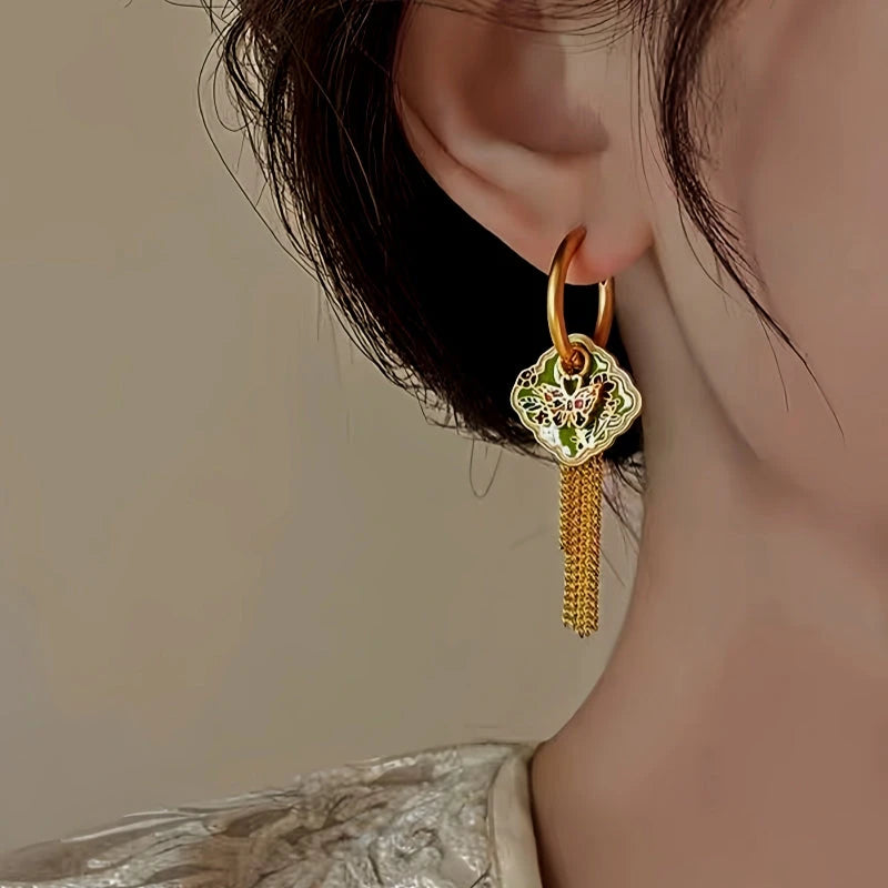 Close-up detail of the sparkling zircons and plating on the Butterfly Tassel Earrings