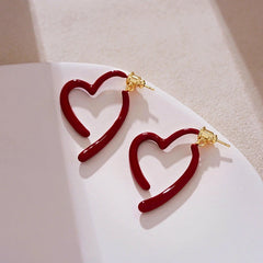 Angled view of the 14K Gold-Plated Elegant Oil Drop Heart Earrings