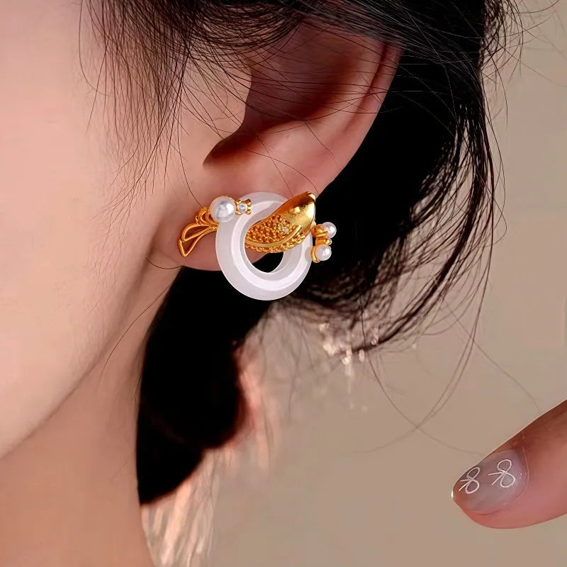 Angled view of the 14K Gold-Plated Elegant Peace Studs