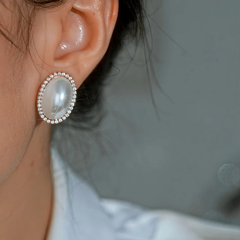 Close-up detail of the sparkling zircons and plating on the Pearl Stud Earrings