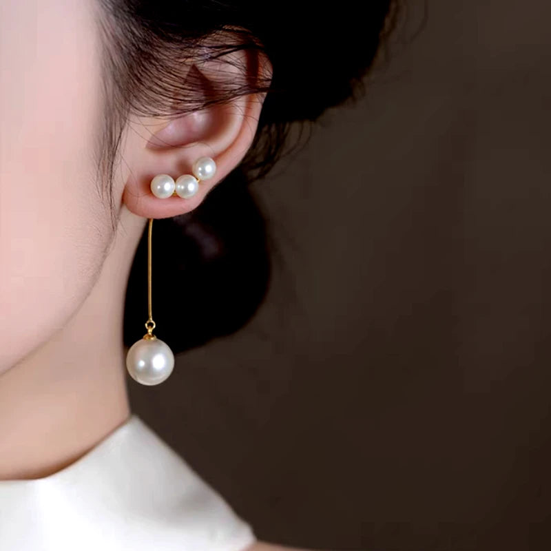 Close-up detail of the sparkling zircons and plating on the Pearl Tassel Earrings