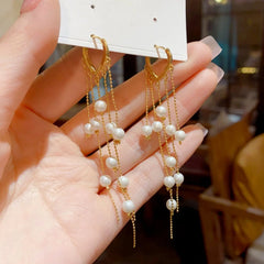 Close-up detail of the sparkling zircons and plating on the Pearl Tassel Earrings