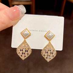 Close-up detail of the sparkling zircons and plating on the Pearl Water Drop Earrings