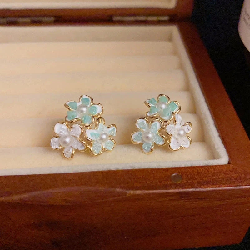 Close-up detail of the sparkling zircons and plating on the Petal Flower Studs
