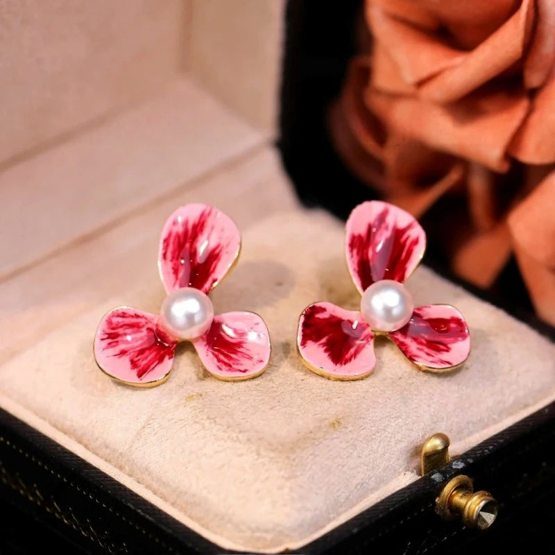 Close-up detail of the sparkling zircons and plating on the Pink Flower Pearl Earrings