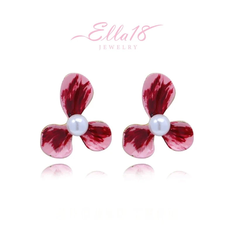 Angled view of the 14K Gold-Plated Elegant Pink Flower Pearl Stud Earrings