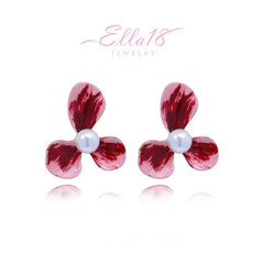 Angled view of the 14K Gold-Plated Elegant Pink Flower Pearl Stud Earrings