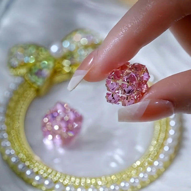 Close-up detail of the sparkling zircons and plating on the Pink Zircon Studs