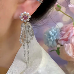 Close-up detail of the sparkling zircons and plating on the Pink Flower Tassel Earrings