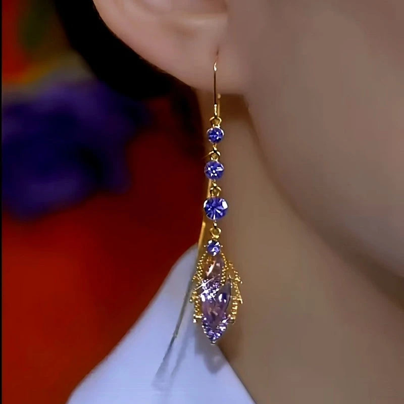 Close-up detail of the sparkling zircons and plating on the Purple Crystal Tassel Earrings